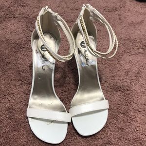 White steeply heels